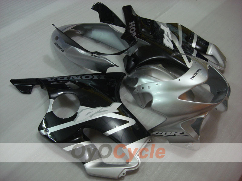 Kit de carenado de inyección para CBR600F4 99-00 - Negro, Plata - Estilo de fábrica #OYO87900121 Imagen principal del producto