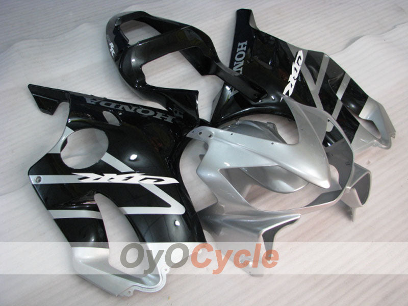 Carenado inyectado para CBR600F4i 01-03 - Negro, Plata - Estilo de fábrica #OYO87904868 Imagen principal del producto